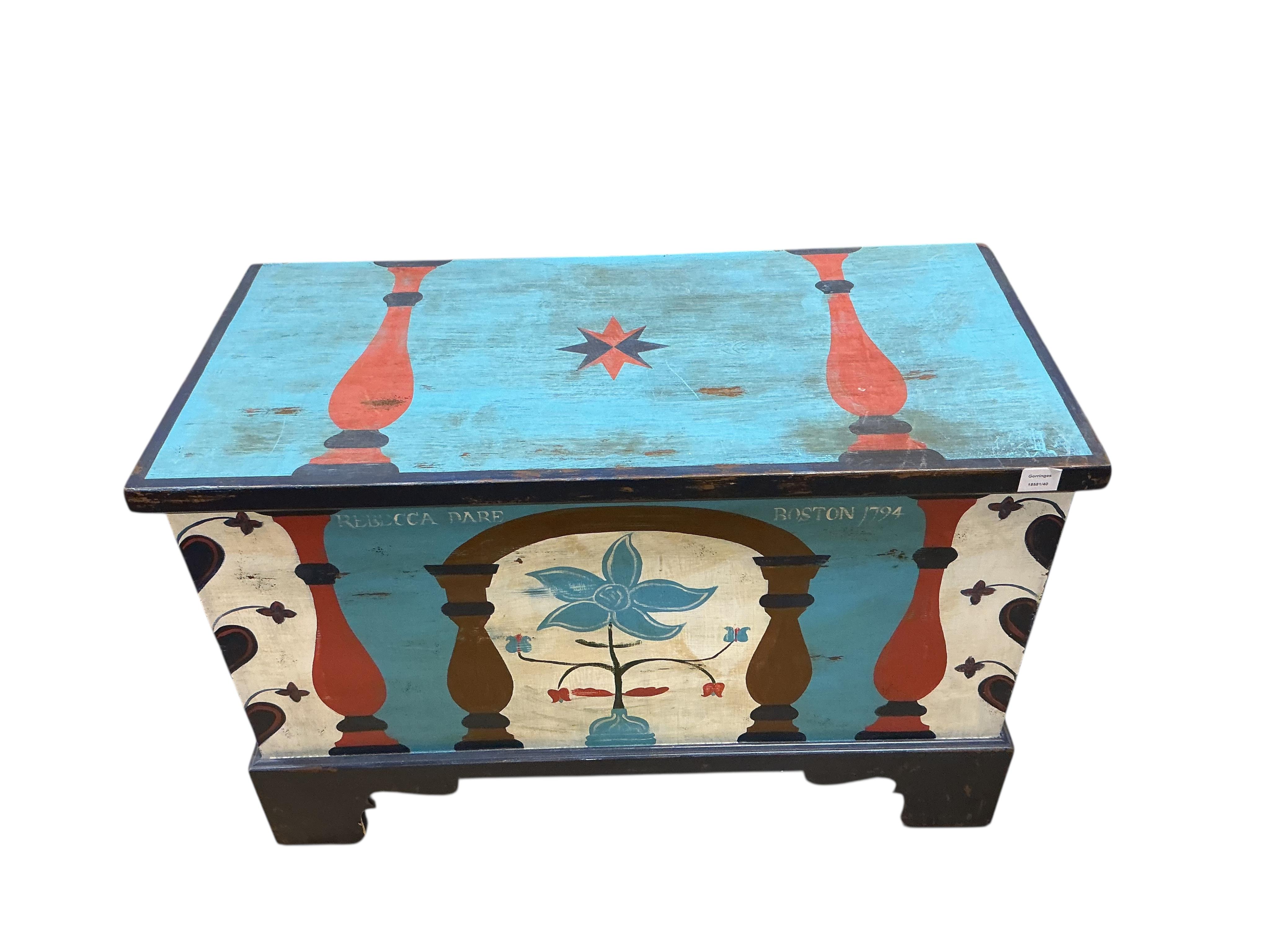A painted chest, floral decorated and inscribed, width 102cm, depth 49cm, height 67cm